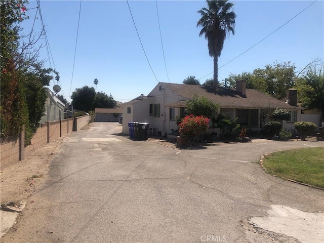 8852 Greenwood Ave, San Gabriel, CA 91775 - view of front facade with fence and a chimney