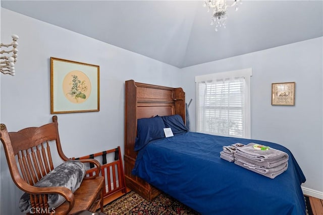 2013 3rd St, Julian, CA 92036 - bedroom with wood finished floors, lofted ceiling, and baseboards