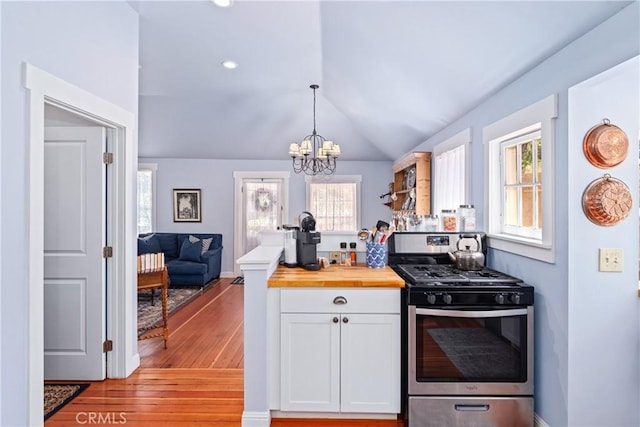 2013 3rd St, Julian, CA 92036 - kitchen featuring stainless steel gas stove, wood counters, a chandelier, plenty of natural light, and lofted ceiling