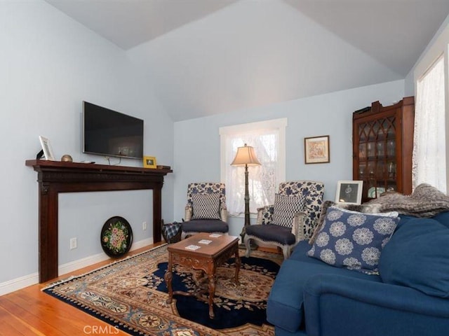 2013 3rd St, Julian, CA 92036 - living room with lofted ceiling, wood finished floors, and baseboards