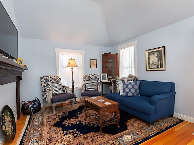 2013 3rd St, Julian, CA 92036 - living area with wood finished floors, vaulted ceiling, and baseboards