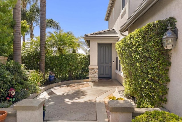 6407 Calmeria Pl, Carlsbad, CA 92011 - view of exterior entry featuring stucco siding