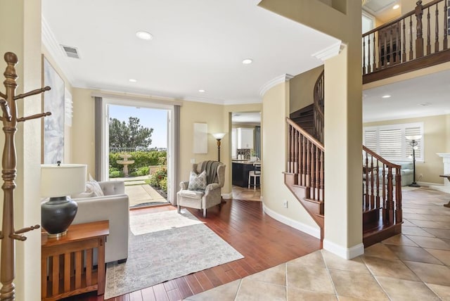 6407 Calmeria Pl, Carlsbad, CA 92011 - tiled living area with crown molding, stairway, recessed lighting, and baseboards