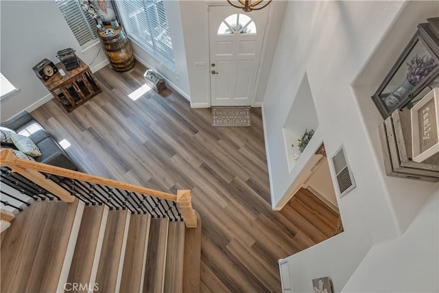 28229 Foothill Rd, Castaic, CA 91384 - foyer with wood finished floors, baseboards, and a chandelier