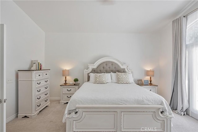 28229 Foothill Rd, Castaic, CA 91384 - bedroom with light carpet, multiple windows, and baseboards