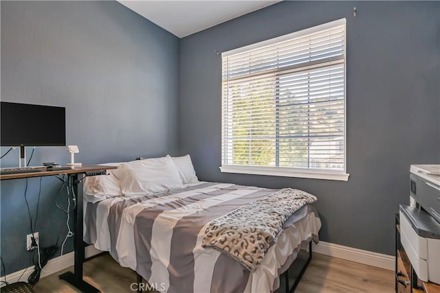 28229 Foothill Rd, Castaic, CA 91384 - bedroom featuring baseboards and wood finished floors