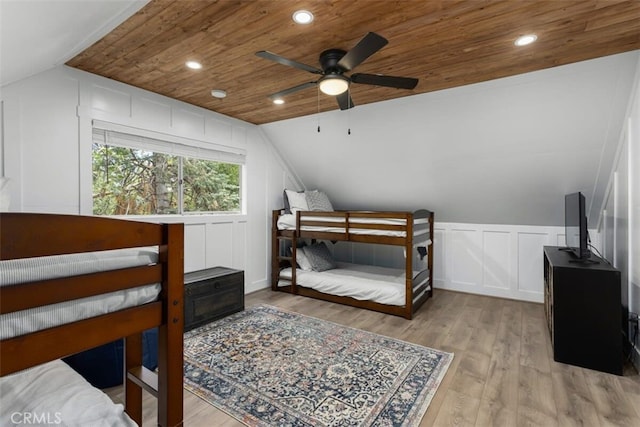 309 Golden Ln, Lake Arrowhead, CA 92352 - bedroom with a decorative wall, wooden ceiling, lofted ceiling, wood finished floors, and recessed lighting