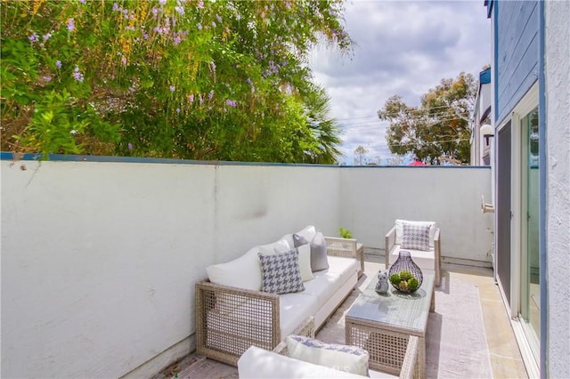 balcony with an outdoor hangout area