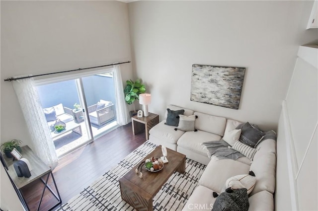 living room with wood finished floors