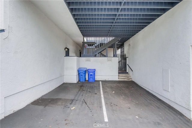 view of vehicle parking featuring a carport
