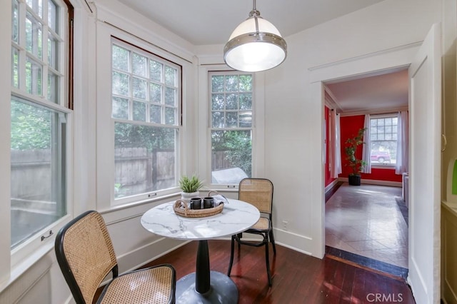 605 E Home Ave, Fresno, CA 93728 - dining space with dark wood finished floors and baseboards