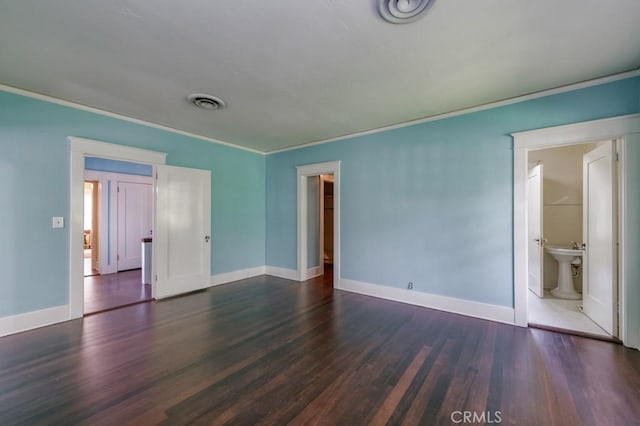 605 E Home Ave, Fresno, CA 93728 - spare room featuring crown molding, dark wood finished floors, and baseboards