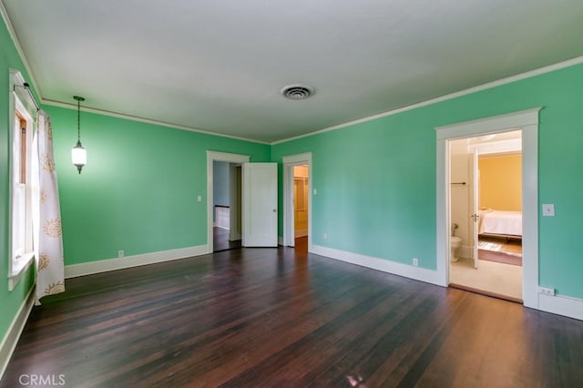 605 E Home Ave, Fresno, CA 93728 - unfurnished bedroom with ornamental molding, dark wood finished floors, and baseboards