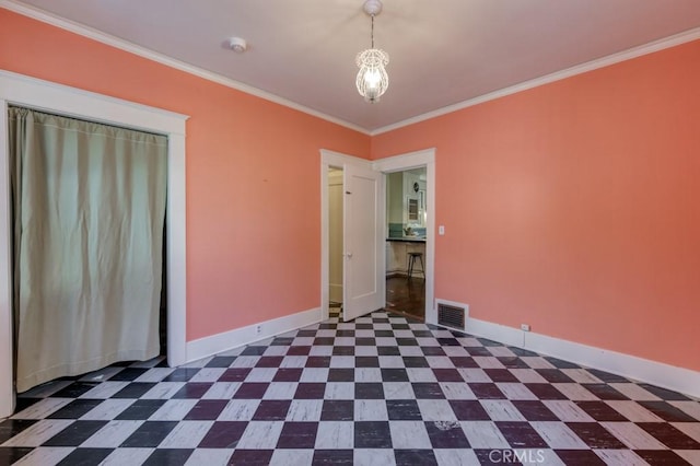 605 E Home Ave, Fresno, CA 93728 - spare room featuring ornamental molding, baseboards, dark floors, and a smoke detector