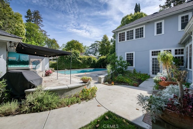 605 E Home Ave, Fresno, CA 93728 - outdoor pool with a patio and a grill
