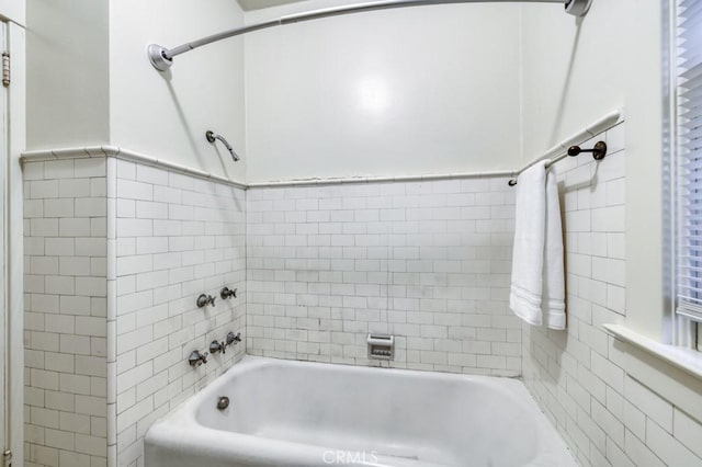 605 E Home Ave, Fresno, CA 93728 - full bathroom with tile walls and bathtub / shower combination