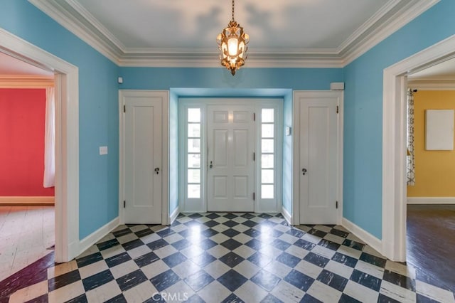 605 E Home Ave, Fresno, CA 93728 - entrance foyer featuring tile patterned floors, baseboards, crown molding, and a chandelier