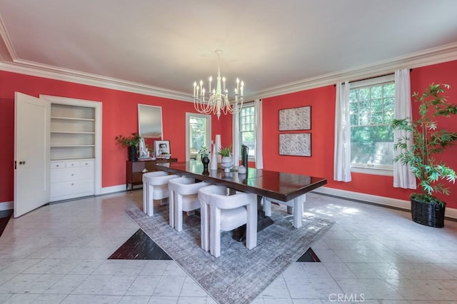 605 E Home Ave, Fresno, CA 93728 - dining area featuring crown molding, a chandelier, and baseboards