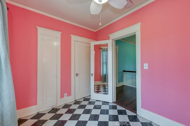 605 E Home Ave, Fresno, CA 93728 - unfurnished bedroom with tile patterned floors, ornamental molding, baseboards, and a ceiling fan