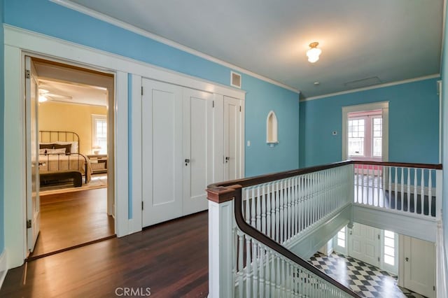 605 E Home Ave, Fresno, CA 93728 - hall with an upstairs landing, crown molding, and dark wood-style flooring
