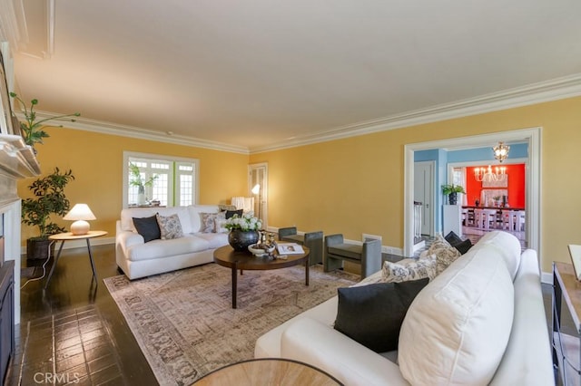 605 E Home Ave, Fresno, CA 93728 - living room with crown molding, baseboards, and a chandelier