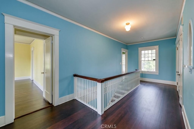 605 E Home Ave, Fresno, CA 93728 - hallway with wood finished floors, an upstairs landing, baseboards, and ornamental molding