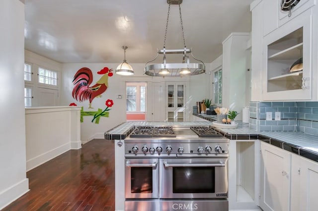 605 E Home Ave, Fresno, CA 93728 - kitchen featuring double oven range, tile countertops, white cabinets, baseboards, and dark wood-style flooring