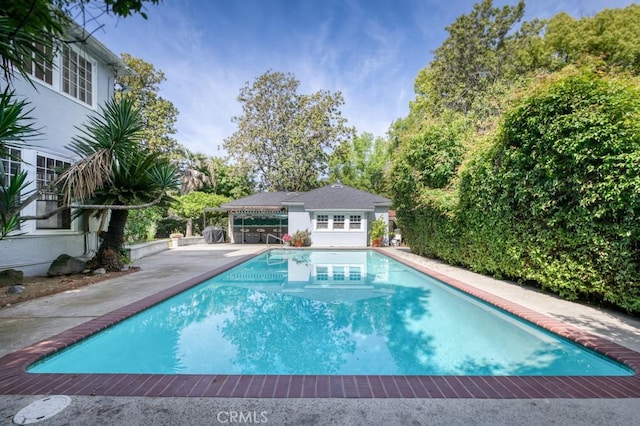 605 E Home Ave, Fresno, CA 93728 - outdoor pool featuring a patio