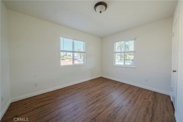 1517 W Romneya Dr, Anaheim, CA 92801 - unfurnished room with wood finished floors and baseboards