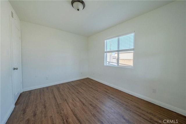 1517 W Romneya Dr, Anaheim, CA 92801 - unfurnished room with wood finished floors and baseboards