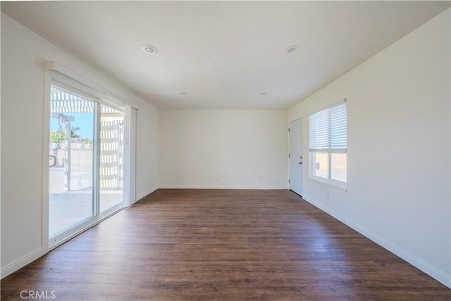 1517 W Romneya Dr, Anaheim, CA 92801 - empty room with dark wood-style flooring, baseboards, and recessed lighting