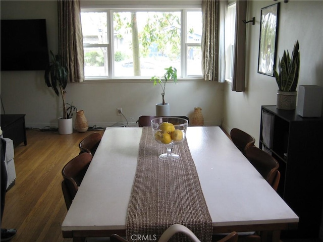 dining room with wood finished floors