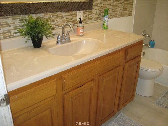 full bathroom featuring vanity, toilet, shower / tub combination, backsplash, and tile patterned floors
