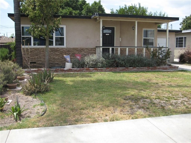 single story home with stone siding, a front lawn, stucco siding, and a porch