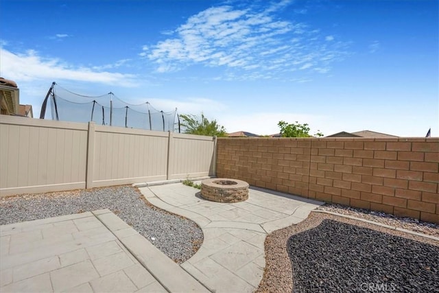 34428 Burnt Pine Rd, Murrieta, CA 92563 - view of patio / terrace featuring an outdoor fire pit and a fenced backyard