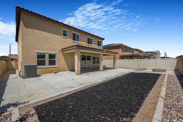 34428 Burnt Pine Rd, Murrieta, CA 92563 - rear view of property with stucco siding, a fenced backyard, a patio area, and central AC unit