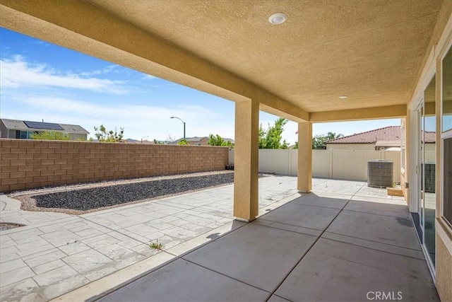 34428 Burnt Pine Rd, Murrieta, CA 92563 - view of patio with a fenced backyard and central AC unit
