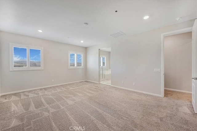 34428 Burnt Pine Rd, Murrieta, CA 92563 - empty room featuring light carpet, baseboards, recessed lighting, and a smoke detector