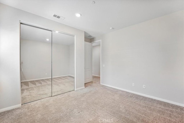 34428 Burnt Pine Rd, Murrieta, CA 92563 - unfurnished bedroom with carpet flooring, a closet, baseboards, and recessed lighting