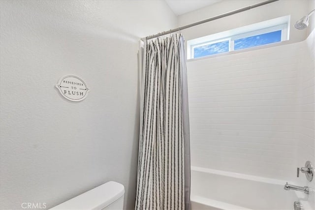 34428 Burnt Pine Rd, Murrieta, CA 92563 - full bathroom with toilet, shower / bath combo, and a textured wall
