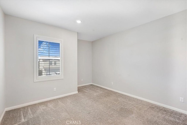 34428 Burnt Pine Rd, Murrieta, CA 92563 - carpeted empty room with baseboards and recessed lighting