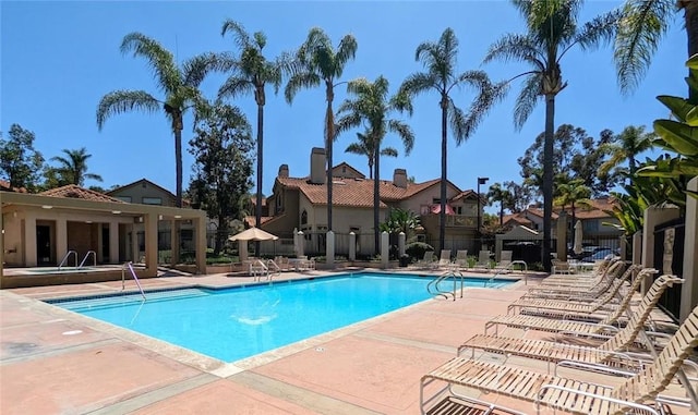 11 Avalon Unit 23, Laguna Niguel, CA 92677 - community pool featuring a patio area and a residential view