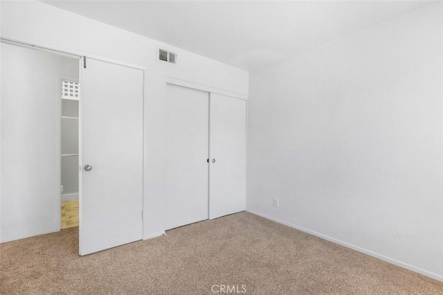 11 Avalon Unit 23, Laguna Niguel, CA 92677 - unfurnished bedroom featuring carpet and a closet