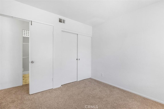 11 Avalon Unit 23, Laguna Niguel, CA 92677 - unfurnished bedroom featuring carpet flooring and a closet