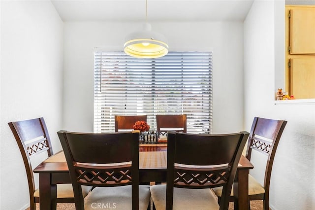 11 Avalon Unit 23, Laguna Niguel, CA 92677 - dining area featuring baseboards