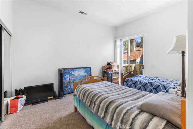 11 Avalon Unit 23, Laguna Niguel, CA 92677 - carpeted bedroom with access to exterior