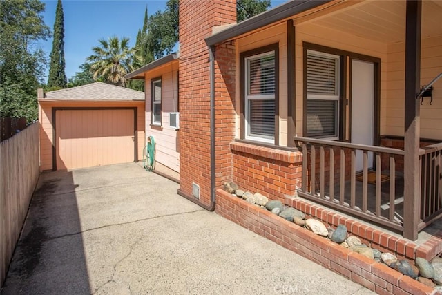 2234 Perkins Ave, Oroville, CA 95966 - view of side of home with fence, a chimney, an outdoor structure, brick siding, and a garage