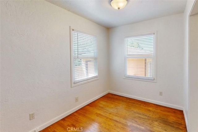 2234 Perkins Ave, Oroville, CA 95966 - unfurnished room featuring baseboards and light wood-type flooring