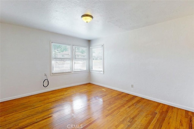 2234 Perkins Ave, Oroville, CA 95966 - empty room featuring light wood-style floors and baseboards