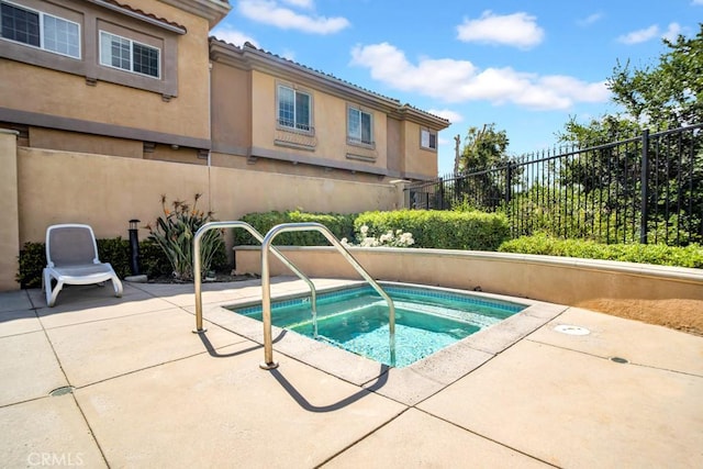 1440 Patricia Ave Unit 102, Simi Valley, CA 93065 - view of swimming pool featuring a community hot tub and a patio area